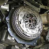 close up of a shiny new clutch fitted to a vauxhall car after the worn out old clutch had to be replaced