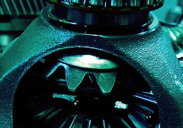 close up side view of a honda civic reconditioned differential zoomed in on the main gears