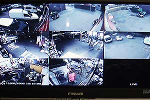 close up of our garages cctv screen showing several camera views of both inside and outside rear of our sheffield garage 